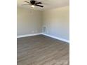 Sunlit living room offers a ceiling fan and wood-look vinyl plank flooring at 1537 Poston Cir, Gastonia, NC 28054