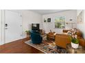 Comfortable living room featuring a stylish rug, furniture, and natural light at 4921 Park Rd # C, Charlotte, NC 28209