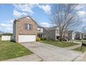View of home and yard with long driveway on a sunny day at 504 Zander Woods Ct, Mount Holly, NC 28120
