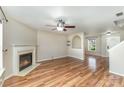 Cozy living room featuring hardwood floors, a fireplace, recessed lighting, and a view of the entryway at 504 Zander Woods Ct, Mount Holly, NC 28120