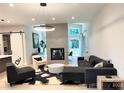 Bright living room features a modern fireplace and stylish decor at 3020 Georgia Ave, Charlotte, NC 28205