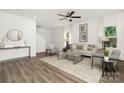 Bright living room with wood floors, neutral decor, and modern furnishings at 4217 Whispering Oaks Dr, Charlotte, NC 28213
