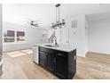 Spacious kitchen with an island, dishwasher, and modern fixtures at 600 Legrand St, Shelby, NC 28150