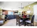 Inviting living and dining areas with sliding glass door access to backyard at 9220 Pinaceal Ct, Charlotte, NC 28215
