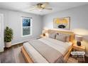 Bedroom with neutral walls, streamlined decor, natural light, and a comfortable king size bed at 1125 Twin Lakes Rd, Rock Hill, SC 29732