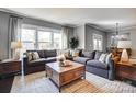 Comfortable living room showcasing a large sectional sofa and natural light at 13240 Carolina Wren Ct, Charlotte, NC 28278