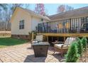 Cozy backyard patio with wicker furniture, perfect for outdoor entertaining and relaxation at 1505 Angela Ct, Lincolnton, NC 28092