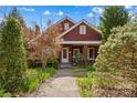 Beautiful brick home with mature trees and landscaping at 719 N Fulton St, Salisbury, NC 28144