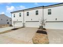 Townhome garages with pristine driveways and well-kept landscaping at 722 Herlong Ave, Rock Hill, SC 29732