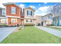 Townhome with verdant lawn, and hardscape at 746 Elders Story Rd, Fort Mill, SC 29708