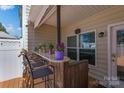 Beautiful outdoor bar with barstool seating, granite countertops, and natural light at 623 Hicklin Dr, Rock Hill, SC 29732