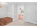 Inviting entryway with tile flooring transitioning to wood floors in adjacent rooms at 2082 Egret Ct, Rock Hill, SC 29732