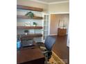 Bright home office with built-in shelves and space to work at 2640 Southern Trace Dr, Waxhaw, NC 28173