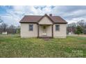 Inviting single-story home with siding, a covered porch, and a neatly kept front lawn at 2915 Spencer Ne Rd, Conover, NC 28613