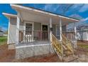Inviting home featuring a quaint porch and a well-maintained exterior, perfect for relaxed living at 1001 Craven Ave, Kannapolis, NC 28083
