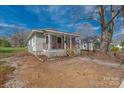 Charming single-story home, showcasing its well-maintained exterior and inviting facade in a residential neighborhood at 1001 Craven Ave, Kannapolis, NC 28083