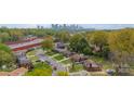 Panoramic aerial view of a residential neighborhood with the city skyline in the distance at 1400 Russell Ave, Charlotte, NC 28216
