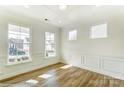 Bright room with hardwood floors, white walls, wainscotting and large windows offering lots of natural light at 1449 Ardmore Dr # 241, Sherrills Ford, NC 28673