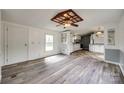 Spacious living room boasting wood floors, and views into the kitchen at 164 Daves Rd, York, SC 29745