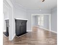 Spacious living area with beautiful floors and black fireplace at 200 N Martin Luther King Jr N Ave, Salisbury, NC 28144