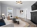 Inviting living room featuring fireplace, neutral tones, and ample natural light at 200 N Martin Luther King Jr N Ave, Salisbury, NC 28144