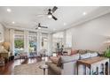 Bright living room features hardwood floors, large windows, neutral tones, and open floor plan at 2508 Shaggy Bark Ct, Belmont, NC 28012