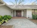 Stunning entryway with double doors and brick accents at 3301 Mountainbrook Rd, Charlotte, NC 28210