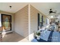 Inviting front porch with comfortable seating, perfect for enjoying a peaceful afternoon at 4501 Brandie Glen Rd, Charlotte, NC 28269