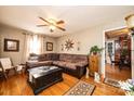 Cozy living room featuring a comfortable sectional sofa, wooden floors, and natural light at 129 38Th St, Hickory, NC 28601