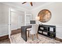 Inviting home office featuring neutral decor, a stylish desk, a large clock, and a patterned rug at 1440 Ardmore Dr # 343, Sherrills Ford, NC 28673