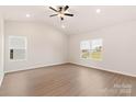 Bright bedroom featuring hard surface floors, recessed lighting and lots of natural light at 3327 Burberry Dr, Gastonia, NC 28052