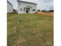 Extensive backyard, providing ample space for outdoor activities and potential landscaping projects at 346 Knotty Wood Dr # 71, Monroe, NC 28110