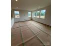 Bright living room with ample natural light, ready for personalization and comfortable living at 346 Knotty Wood Dr # 71, Monroe, NC 28110