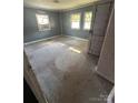 Bedroom with natural light streaming through the windows, offering a serene and inviting atmosphere at 424 Keels Ave, Rock Hill, SC 29730