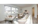 A stylish and inviting living room featuring modern decor, light-filled spaces, and elegant accents at 4601 Mendham Dr, Charlotte, NC 28215