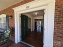 Inviting entrance showcasing the home's interior and hardwood floors at 304 Taft St, Troy, NC 27371