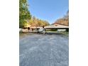 View of the home, carport and adjacent parking area at 4834 Barrett Rd, Kings Mountain, NC 28086