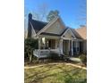 Inviting covered front porch, a cozy spot to enjoy the outdoors at 7144 Hunters Bluff Dr, Denver, NC 28037