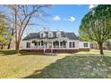 Inviting single-story home with a charming front porch, dormer windows, and well-maintained landscaping at 737 Sanside Dr, York, SC 29745