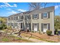 Beautiful two-story home featuring black shutters and well-maintained landscaping at 343 Wakefield Dr # B, Charlotte, NC 28209