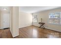 Bright living room featuring hardwood floors, neutral walls, and plenty of natural light at 343 Wakefield Dr # B, Charlotte, NC 28209