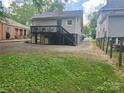 View of backyard with elevated deck at 415 W Warren St, Shelby, NC 28150
