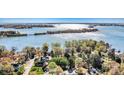 Stunning aerial view of waterfront property on Lake Norman with direct water access and surrounding greenery at 4221 Lake Shore S Rd, Denver, NC 28037