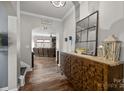 Stylish foyer featuring hardwood floors and modern decor at 5030 Lily Pond Cir, Waxhaw, NC 28173