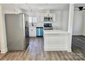 Well-lit kitchen featuring stainless steel appliances, a breakfast bar, and ample counter space, perfect for cooking and entertaining at 915 2Nd St, Kings Mountain, NC 28086