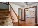 Hallway with hardwood floors and views into a light-filled living space at 1008 High Wedge Rd, Shelby, NC 28152