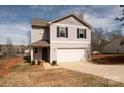 Lovely two-story home with a convenient two-car garage and inviting facade at 4852 Stone Dr, Conover, NC 28613