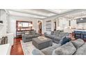 Spacious living room with hardwood floors and comfortable seating arrangements at 7308 Amberwood Ct, Charlotte, NC 28226