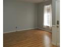 Bright bedroom with a large window and neutral walls, creating a serene atmosphere at 7814 Rolling Meadows Ln, Huntersville, NC 28078