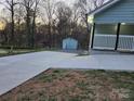New expansive concrete driveway leading to the residence and providing ample parking space at 84 13Th Se St, Hickory, NC 28601
